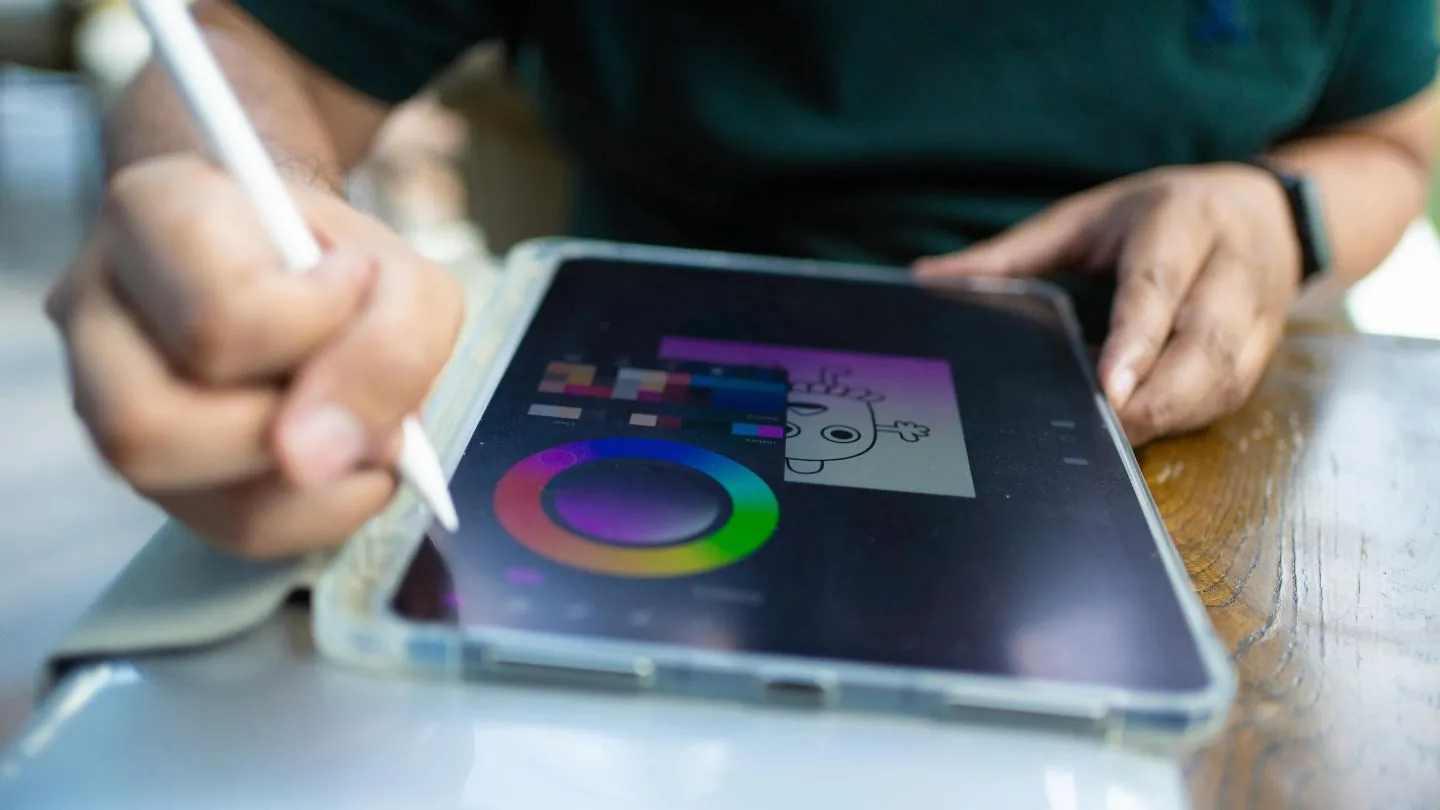 Digital Artist Drawing On Tablet